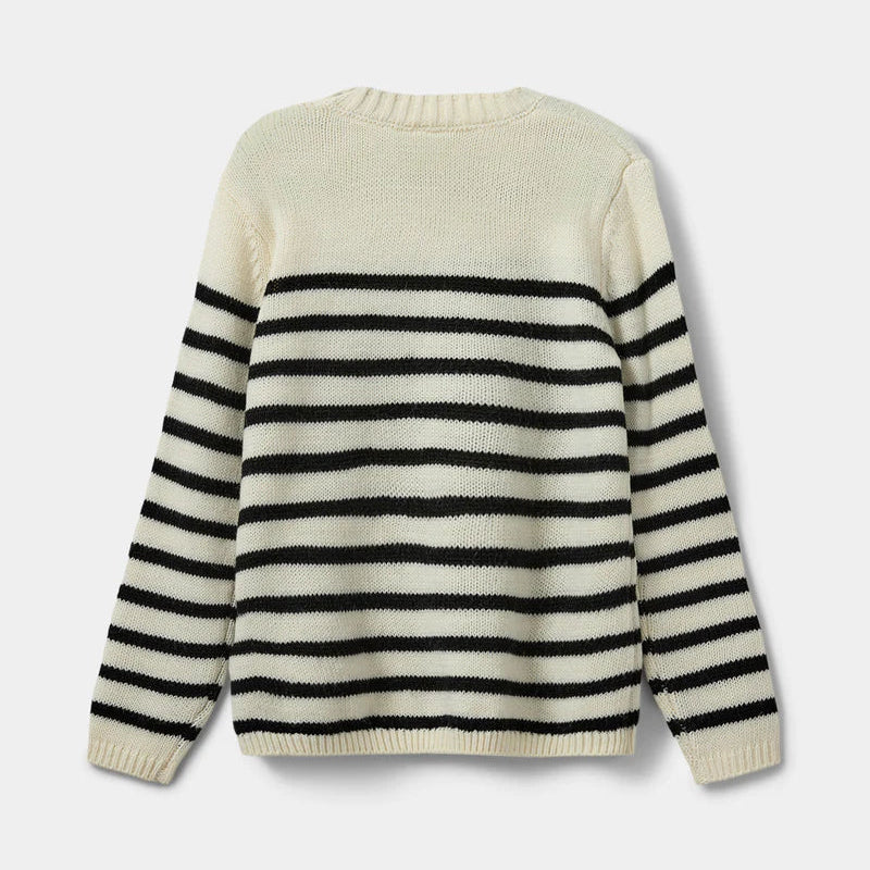 Striped sweater with black and white stripes on a light gray background