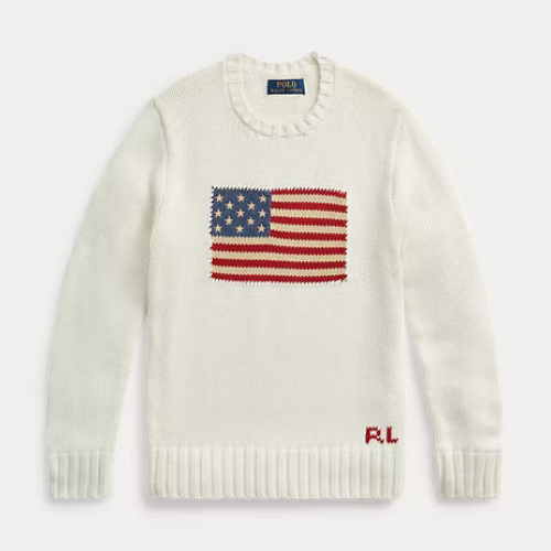 An off-white knit sweater featuring a knitted American flag graphic on the chest and an 'R.L' logo on the lower right hem, displayed flat against a light gray background.