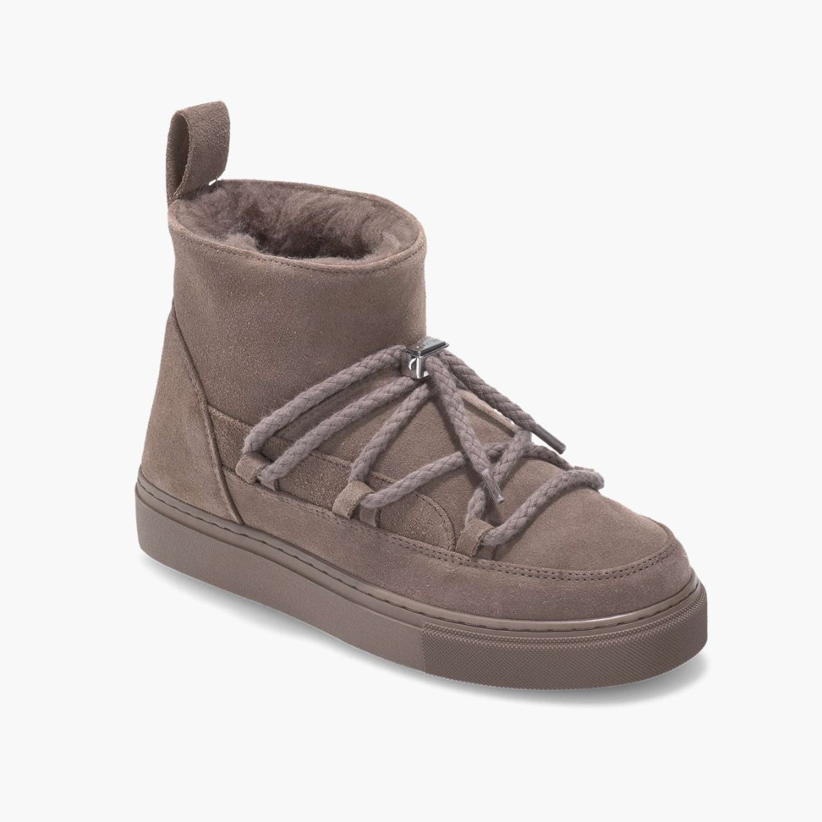 Brown suede ankle boot with fur lining on a white background