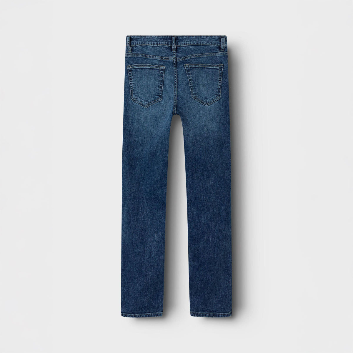 Blue jeans on a white background