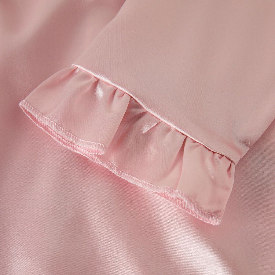 Close-up of a pink fabric with ruffled edge