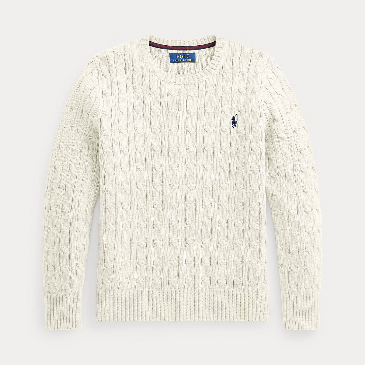 An off-white cable-knit crewneck sweater by Polo Ralph Lauren, featuring a small navy blue embroidered pony logo on the left chest, displayed against a light gray background.